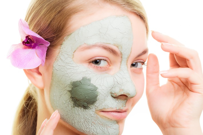 Skin Care. Woman In Clay Mud Mask On Face. Beauty.